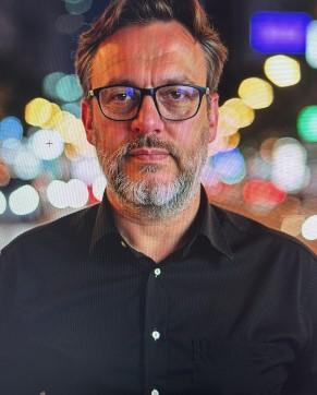 Simon G Booth
